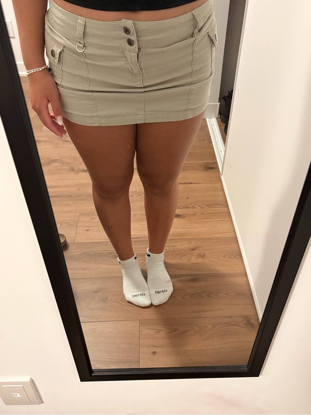 beige mini skirt